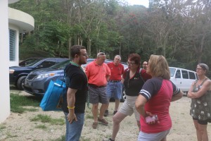 The team in Humacao learning about the many challenges of rescuing dogs in Puerto Rico.